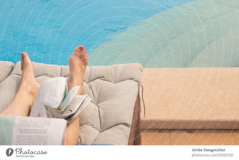 Relaxed reading newspaper by the pool relaxation vacation red nail polish feet Feet Blue Water Skin Summer Sun Read newspaper sun lounger