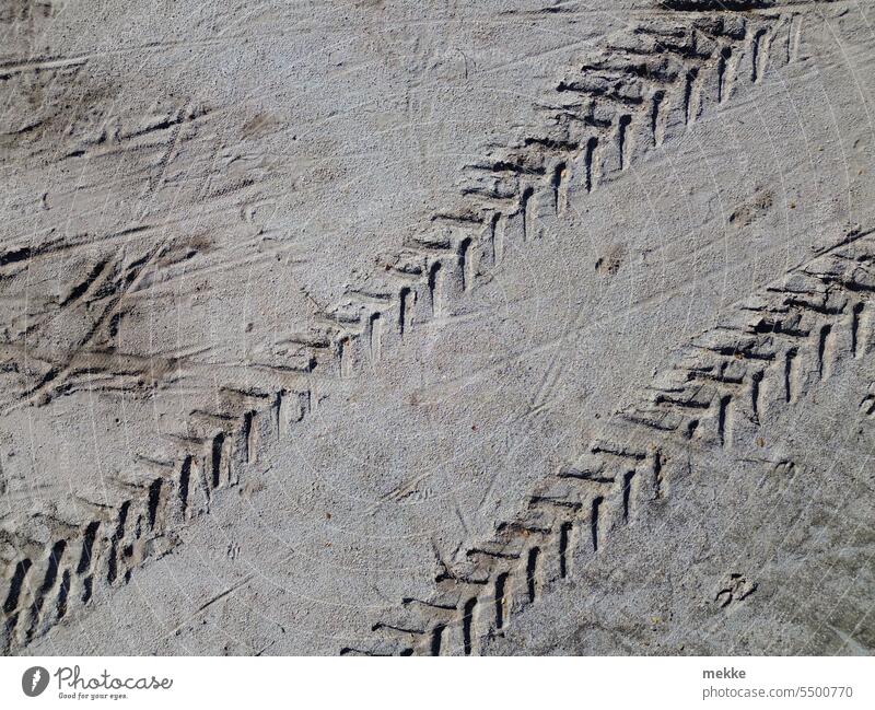 Traces in the sand Tracks Sand Beach Skid marks Ground Nature Profile Desert groove Stripe trace Muddled Sandy beach Imprint Destruction Plain Surface scars