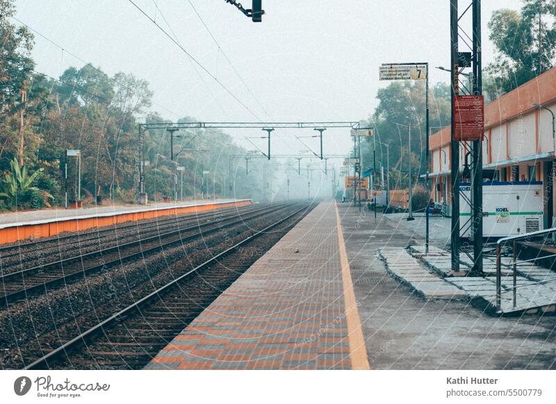 lonely train station in india early in the morning Train station India Kerala Asia Exotic Vacation & Travel Exterior shot Summer Colour photo Nature Deserted