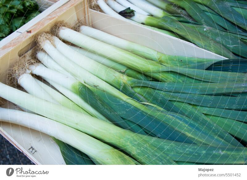 Fresh leeks in a market. cooking freshness natural agriculture allium ampeloprasum background beautiful bio bunch close up closeup color colorful delicious diet