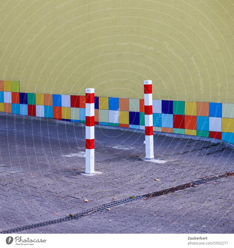 Colorful squares and bars with square cross section in urban driveway poles Bollard variegated Highway ramp (entrance) shape colors structures