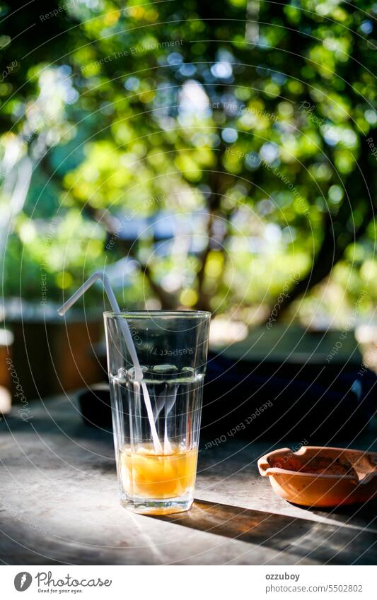 empty glass of lychee tea in sunny day no people drink drinking glass freshness close-up horizontal refreshment outdoors table water summer liquid