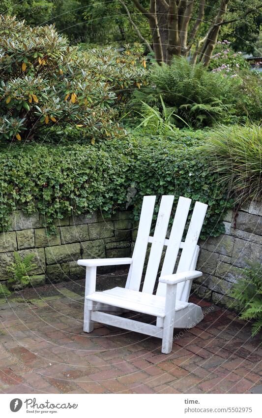 every now and then | a free chair in the park Chair Armchair Wall (barrier) Park Seating White Heavy Varnished plants Environment paved Break recover rest
