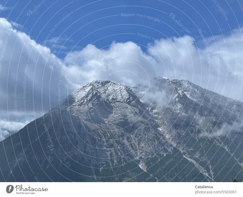 Weather break with fresh snow on the mountain peaks in June Alps Clouds Landscape Peak mountains Sky Snowcapped peak Environment Rock Day Nature Deserted