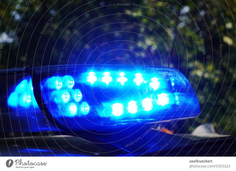 emergency blue light on police car or rescue vehicle at night emergency light crime dark germany blaulicht roof top urgency help safety urgent rooftop ambulance