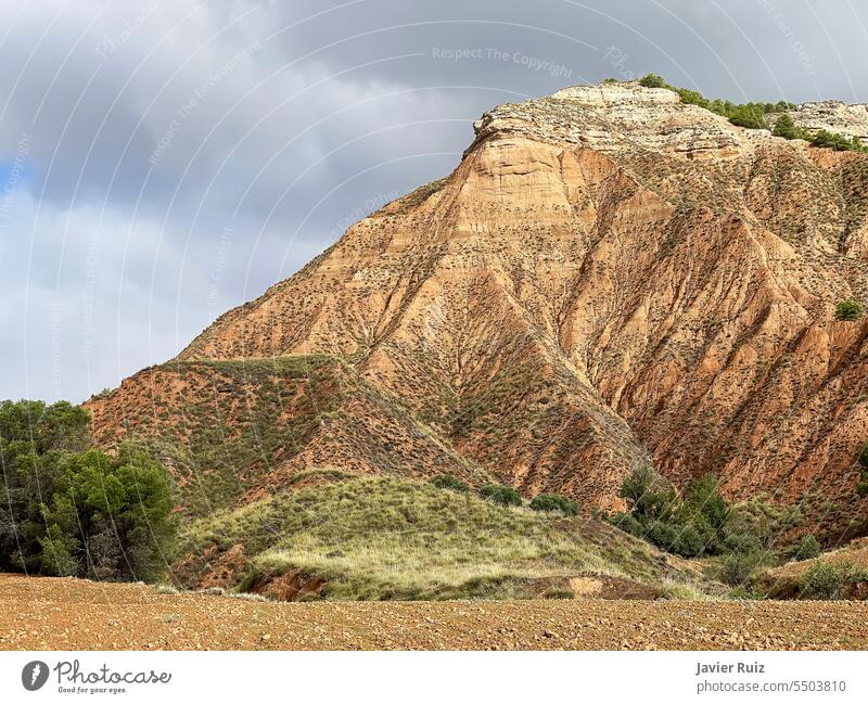 close up of the mountain Pico del Aguila, tabular relief of the Alcarria moor in the Spanish province of Guadalajara, Spain Pico del aguila brown eroded peak