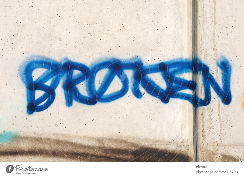 BROKEN is written in blue letters on a concrete wall broken Broken Gamer language youth language shattered Ruined Graffiti Design Unfair Defective English