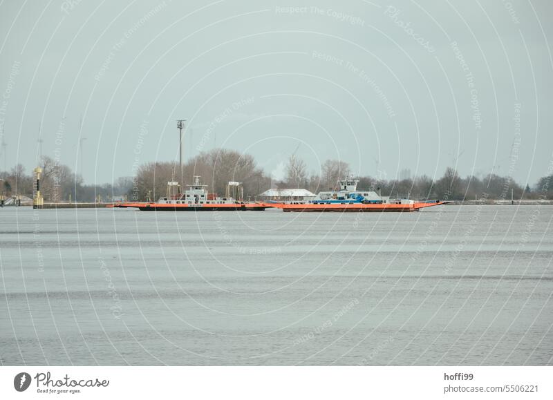 Car ferry on a river Ferry ferry trip River Watercraft Navigation Exterior shot Boating trip Passenger ship Waves Traverse ferry connection Subdued colour