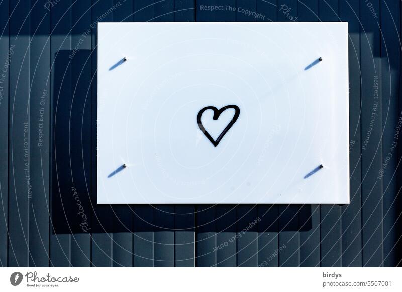 plain heart on white raised area against dark background Heart Love display shadow cast Display of affection unostentatious Symbols and metaphors