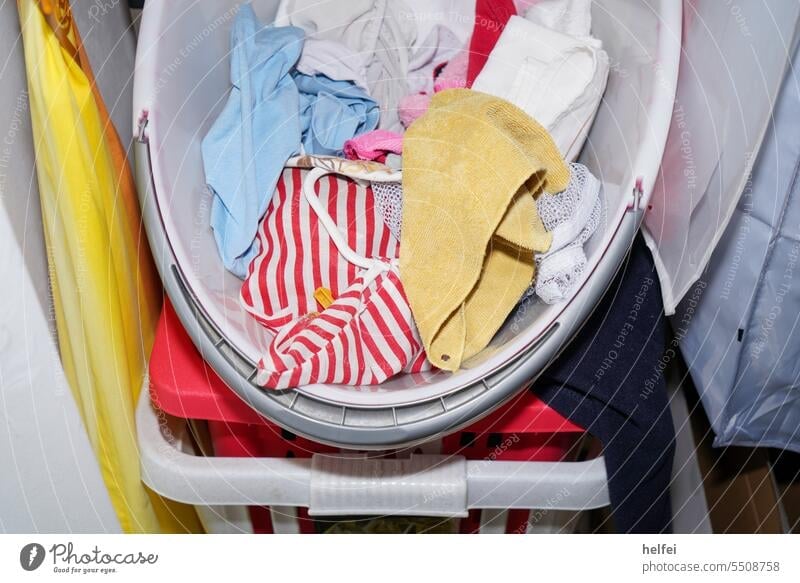 Laundry basket with washed clothes ready for ironing Washing Washing day Clothing Living or residing Dry Clean garments Fresh Photos of everyday life