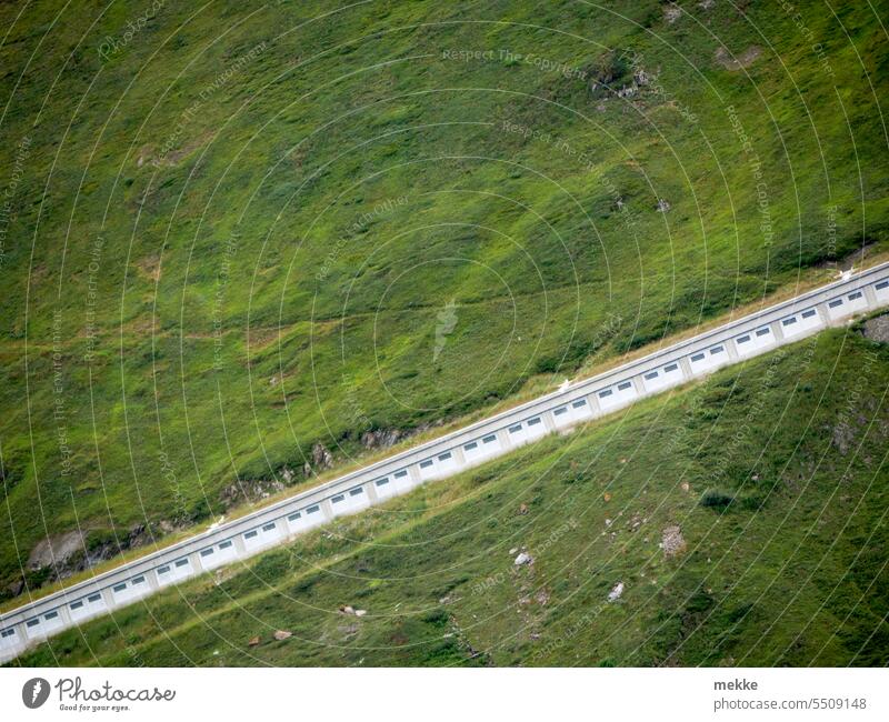 steeply uphill mountain slope Street Steep Mountain Nature Tourism Landscape Alps Tunnel gallery meadows off rise Green Grass Willow tree Alpine pasture Slope