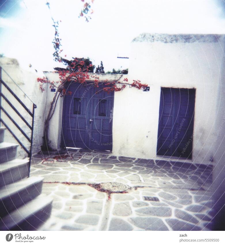 at the Greek's Lomography Analog Sky Slide Holga Scan Greece Cyclades Greek Islands Cycladic architecture Village White Blue Places Stairs