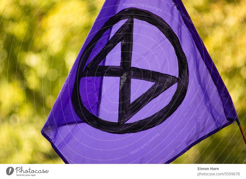 Flag of the environmental movement Extinction Rebellion symbol radical Civil disobedience protest Actions youthful Environmental protection Controversial