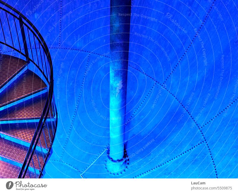 Into the Blue - Descent into the unknown Stairs Winding staircase Column Round Boiler Downward Eerie rail Banister stair treads into the blue colored Light