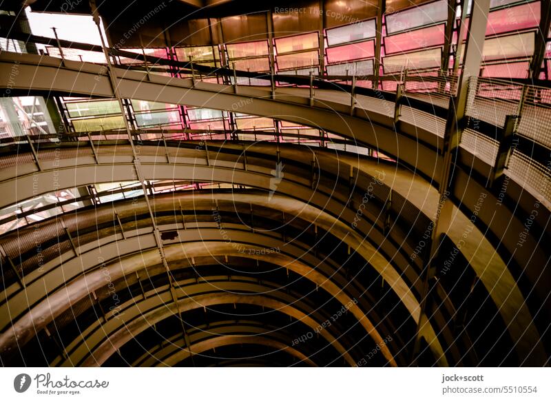 in circles up or down roundabout Parking garage Wide angle Modern architecture helical Building Traffic infrastructure Shadow Spiral Round construction rail