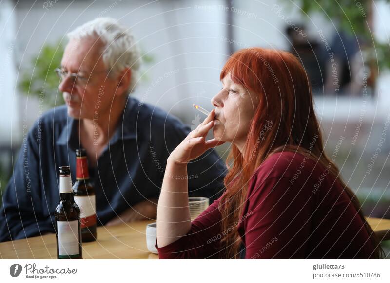 Drinkje bej Inkje | When everything is said... Man and woman sitting silently at the table, smoking and drinking beer portrait Woman Adults Couple Divide