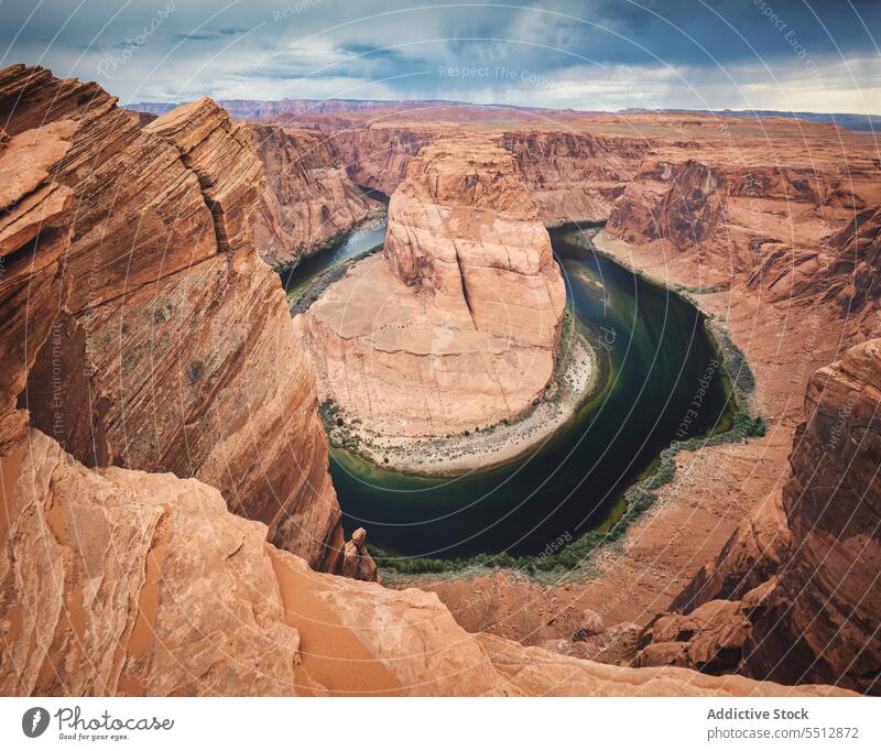Colorado river surrounded by rocky formations canyon arizona nature grand canyon landscape usa america landmark geology gorge national environment location