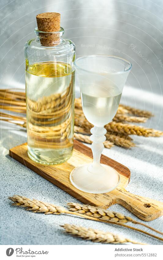 Traditional Ukrainian alcoholic drink made from wheat and known as Gorilka gorilka ukrainian vodka traditional bottle glass transparent cutting board liquid