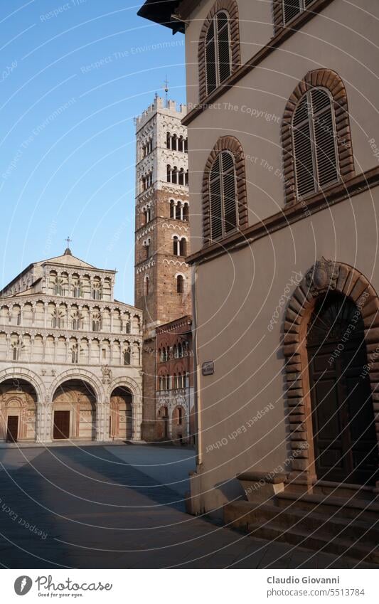 Exterior of the Duomo of Lucca,  Tuscany, Italy, medieval building architecture cathedral church city color day duomo Europe exterior facade historic landmark