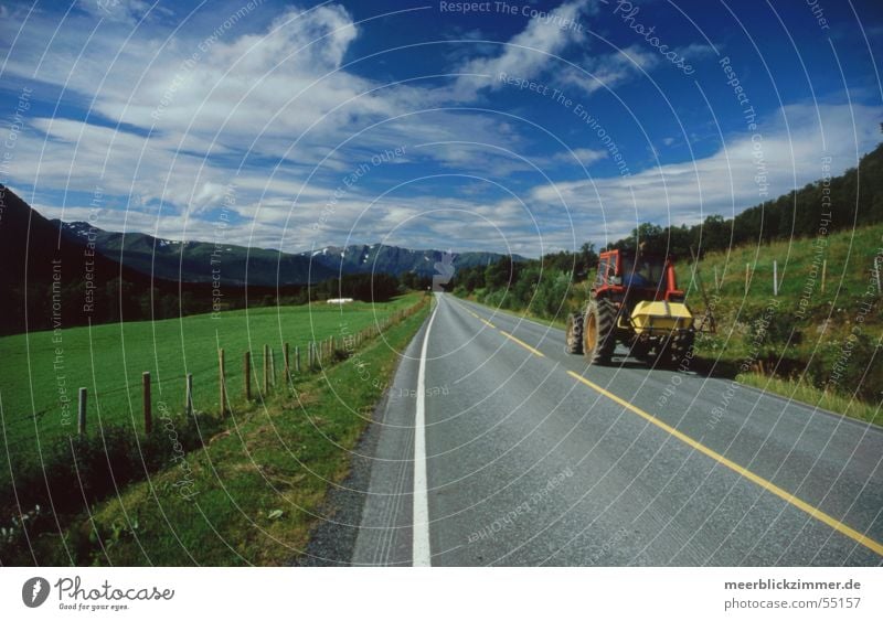 agriculture Tractor Agriculture Field Meadow Green Norway Lofotes Center line Clouds Fence Stripe Old Farmer Blue sky Mountain Street Border Line
