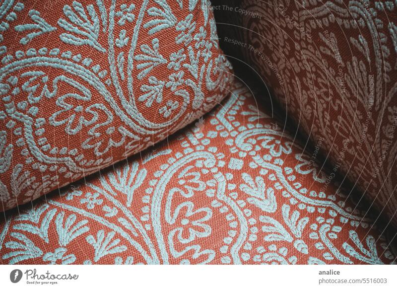 Couch texture detail Cushion fabric Orange Detail pattern textile material closeup background fashion cloth Abstract color floral pattern Embroidery