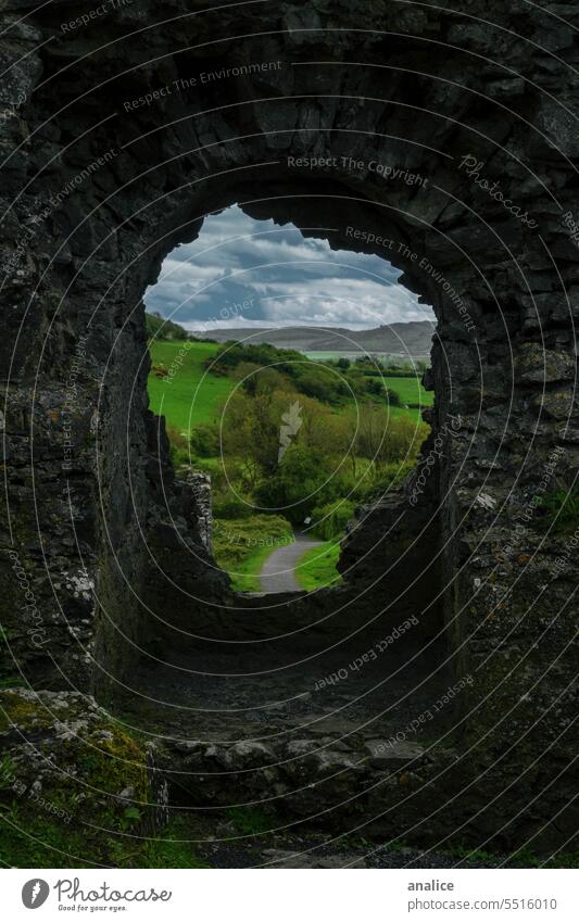 Village view through an old window Nature Window Wall (building) Wall (barrier) Hole Deserted path pathway Green history Ireland Castle old castle windows