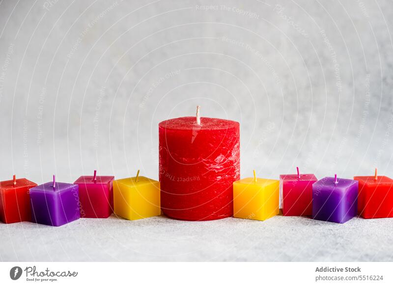 Various colored scented candles placed on surface hanukkah celebrate festival tradition religion event culture symbol decor season multicolored pride decoration