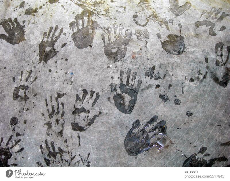 Handprints hands Many Imprint in common Fingers Gray Black handprint Creativity Touch Structures and shapes Street art Tracks Palm of the hand fellowship