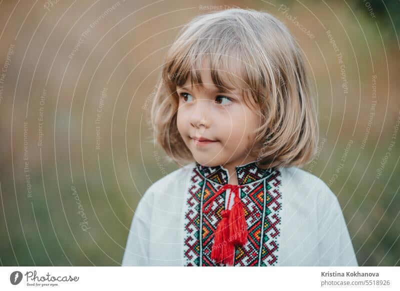 Portrait of handsome ukrainian boy in apple orchard.Child traditional embroidery happiness kid summer ukraine field happy background brothers childhood children