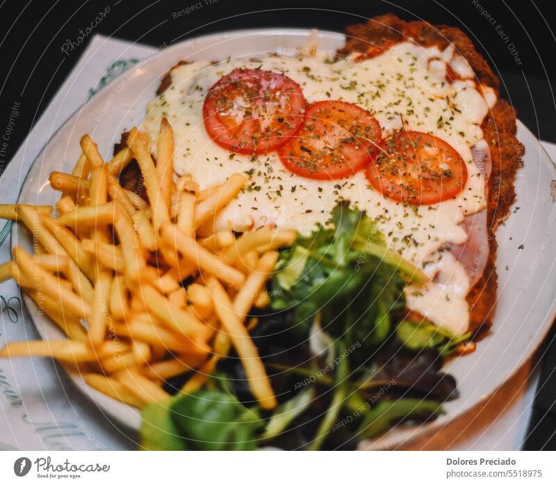 Neapolitan beef Milanese typical of Argentina and Uruguay argentina culture argentina food argentine background breaded buenos aires cheddar cheese chicken