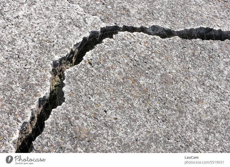 Fissure in the earth - crack in the landscape Crack & Rip & Tear crack formation Crack in floor Stone Asphalt Ground Broken Street cut Column Crevice Detail