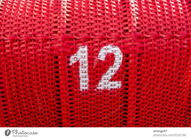 Beach chair no. 12 Red Numbering Close-up Rear view Colour photo Exterior shot Day Deserted Vacation & Travel Baltic Sea basketwork wind deflector