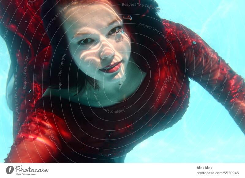 Denise - underwater portrait of young beautiful woman with red ball gown in swimming pool Underwater photo Long-haired be afloat Dive Fresh Refreshment