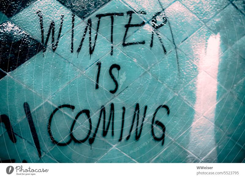 next winter will come for sure Winter Come Cold colder forthcoming announcement threat Warn Wall (building) writing graffiti words English authored tiles Green