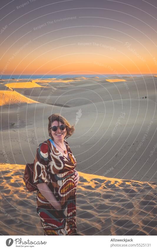 happy middle-aged pregnant woman in the dunes of MasPalomas on Gran Canaria Azores Island vacation Vacation photo Vacation destination Vacation mood Summer