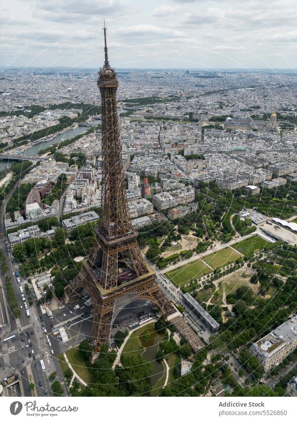 Famous Eiffel tower on cloudy day eiffel tower cityscape paris landmark sightseeing river tourism travel attract destination famous visit skyline blue sky