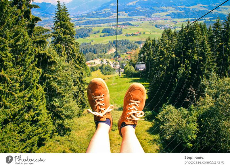 Feet in the Alps Footwear Feet up Mountain mountain landscape firs Allgäu chair lift lace-up shoes Bavaria mountains Slope Coniferous forest Fir tree Nature