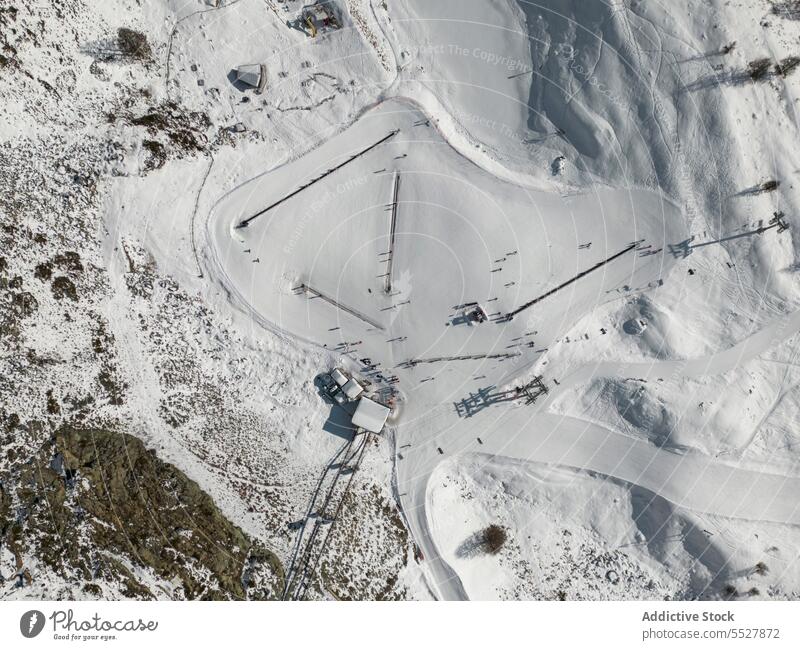 Mountain skiing resort from drone ridge mountain snow slope alps nature summer valley season activity switzerland swiss alps cold scenic climate altitude