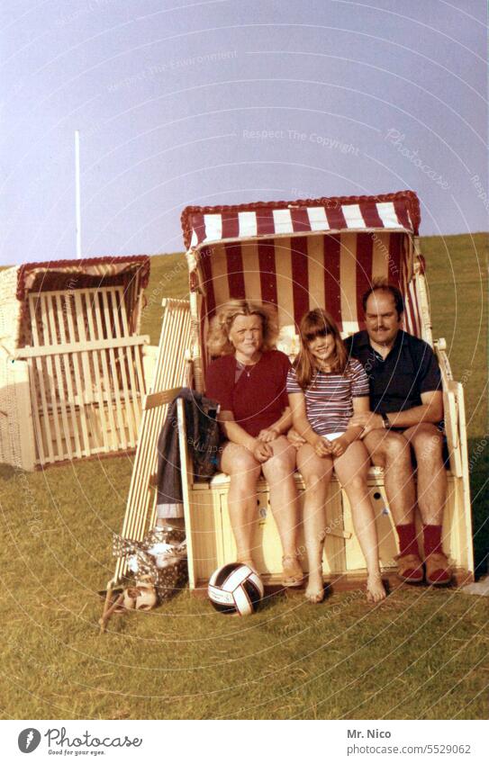 on the North Sea coast Beach chair Vacation & Travel Summer vacation Tourism Relaxation beach chairs Stripe Childhood memory Domestic happiness 70s Together