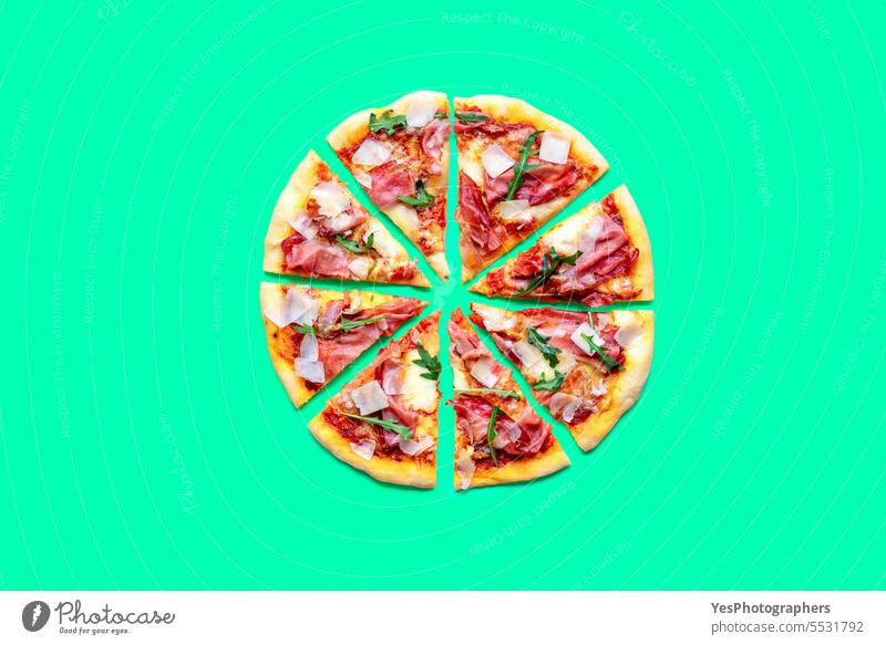 Homemade ham pizza minimalist on a green background above arugula baked bright chart cheese color colorful comfort crust cuisine delicious dinner eating fast