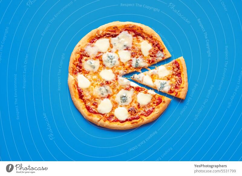 Sliced pizza top view on a blue background above baked brie bright chart cheese color colorful comfort crust cuisine delicious dinner dish eating fast food