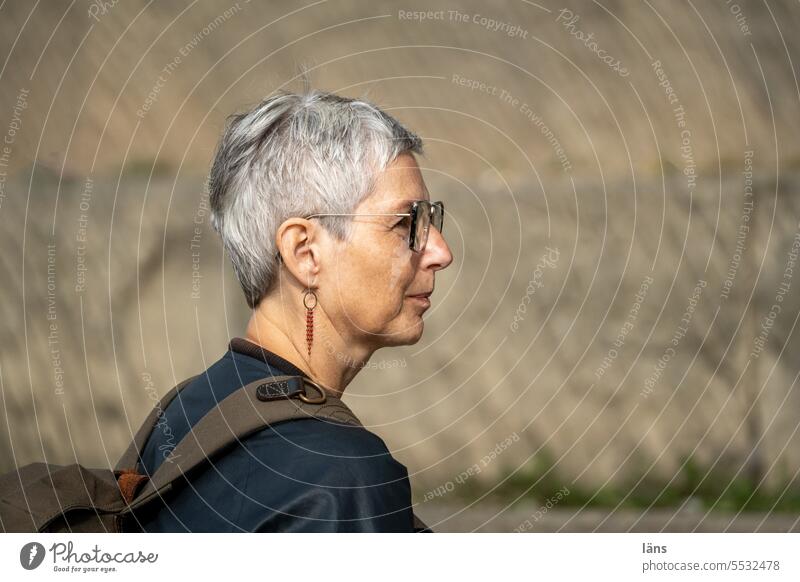 Wide land l short haired woman in side view Woman portrait Feminine pretty Hair and hairstyles Short-haired lateral view