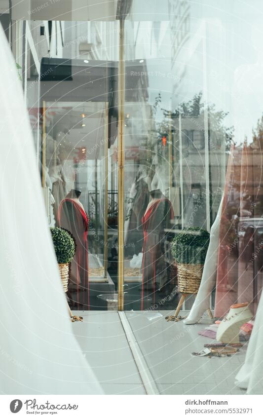 Wide land | Fashion in the mirror Shop window red dress Red dresses Mannequin shop window reflection Reflection Exterior shot pretty Doll Feminine Clothing