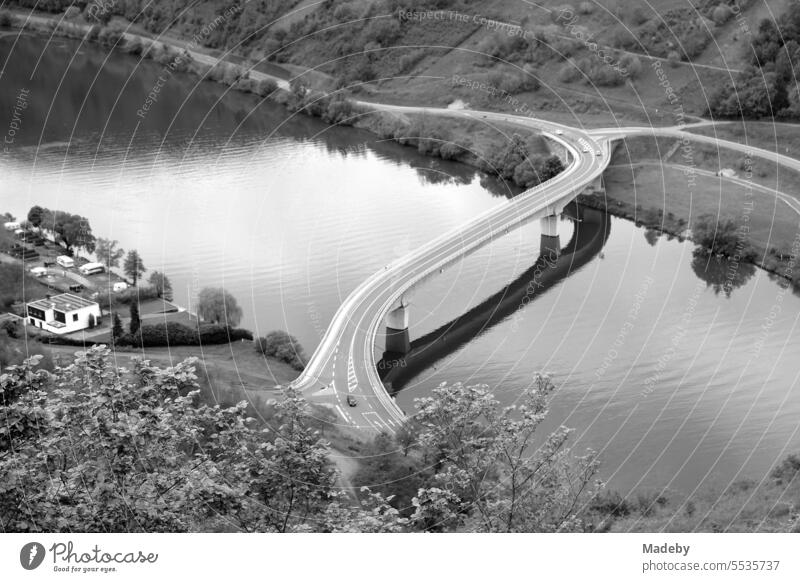 Panorama other Moselle with grand landscape and modern bridge between mountain and valley in sunshine in Traben-Trarbach in Bernkastel-Wittlich district in Rhineland-Palatinate in Germany in classic black and white