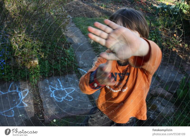 Child holds hand in front of his face repulse sb./sth. stop no Hand Protest Emotions Border Palm of the hand Protective Children's game Resolve Defensiveness