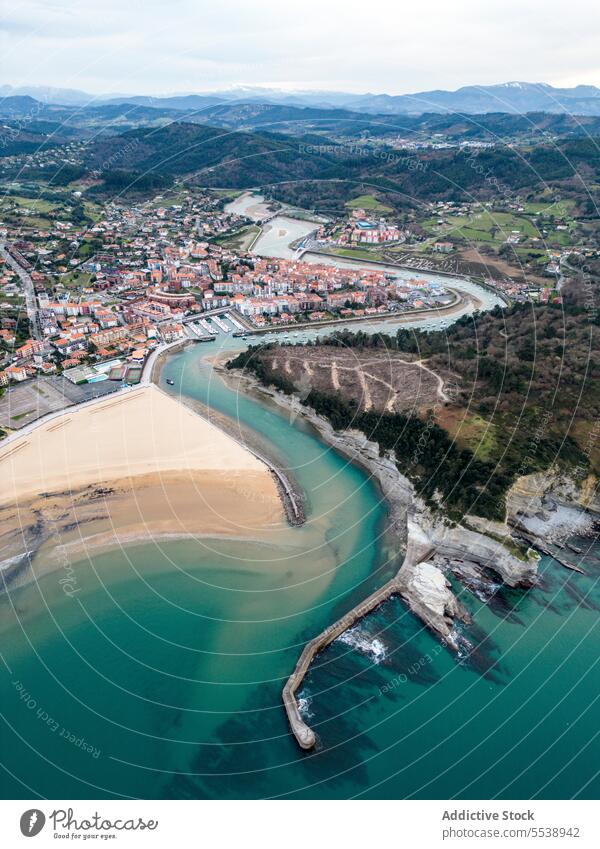 Aerial view of sandy beach and tropical ocean sea water summer coast nature shore seashore coastline basque seaside marine summertime blue idyllic aerial remote