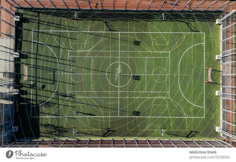 Green football pitch in daylight field soccer game sport sports ground lawn mark court geometry green line background symmetry design structure area remote