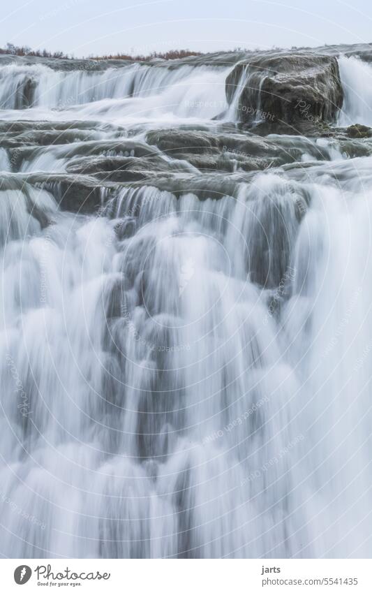 gentle waterfall Waterfall Wild Smooth Iceland Long exposure River Rock Nature Landscape Flow naturally Force Stream Elements Movement Picturesque Stone Energy