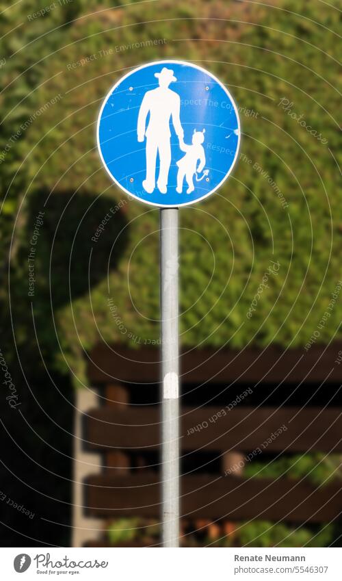 Humorous road sign pedestrian with little devil Road sign Pedestrian Signs and labeling Signage Lanes & trails Traffic infrastructure Exterior shot Warning sign