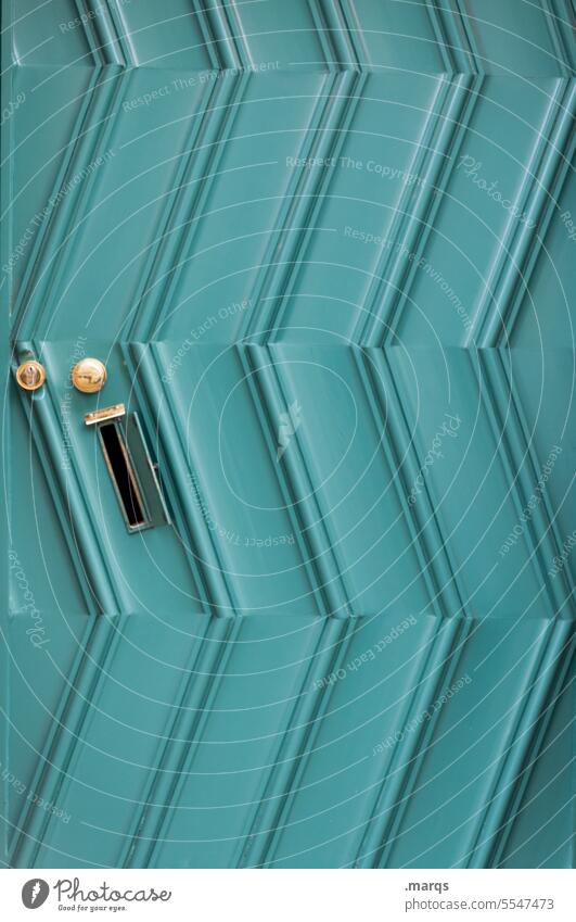 Funny door Entrance Front door Closed door handle Structures and shapes Turquoise obliquely Arrangement Close-up differently Exceptional Mailbox slot